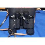 PAIR OF KENLOCK 10 X 50 BINOCULARS
in case and a clock movement