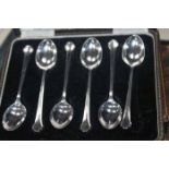 COLLECTION OF THREE SILVER CASED COFFEE SPOON SETS
all hallmarked sterling silver;
