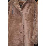 LADY'S VINTAGE SHEEPSKIN COAT
double-breasted with three buttons, HeaTona interior label,