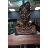 CARVED WOOD BUST OF A MAN
mounted on an wooden base,