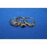 THREE GOLD DRESS RINGS
including a blue zircon and diamond set example,