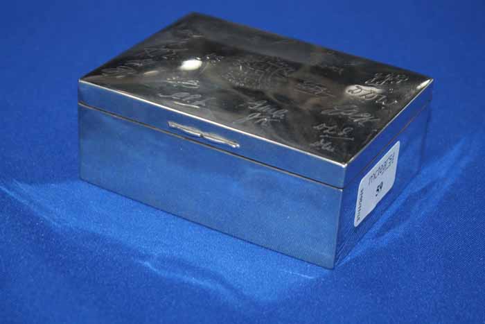 GEORGE V SILVER CIGARETTE CASKET
engraved with the 'High School of Glasgow' crest and with