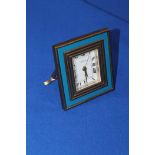 ENAMELLED BRASS GUCCI TRAVEL CLOCK
signed 8 day French keyless wind movement,