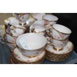 EARLY 20TH CENTURY TUSCAN FINE ENGLISH BONE CHINA TEA SERVICE
decorated with pink flowers on a pale