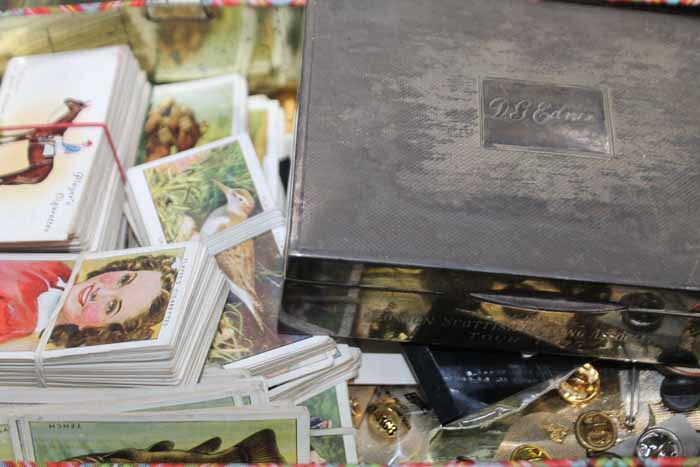 COLLECTION OF CIGARETTE CARDS
together with a trinket box, medals, badges,