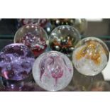 COLLECTION OF FIVE CAITHNESS COLOURED GLASS PAPERWEIGHTS