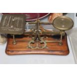 SET OF VICTORIAN BRASS AND MAHOGANY MOUNTED POSTAL SCALES
with weights,