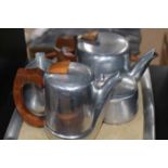 PICQUOT WARE TEA SERVICE
comprising a teapot, water pot, sugar and cream,