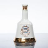 BELL'S PRINCE OF WALES BELL
Blended Scotch Whisky in white Wade ceramic decanter. 50cl, 40% volume.