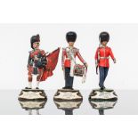 COLLECTION OF THREE HAND-PAINTED SCOTS GUARDS MILITARY FIGURINES
by Chas Stadden,