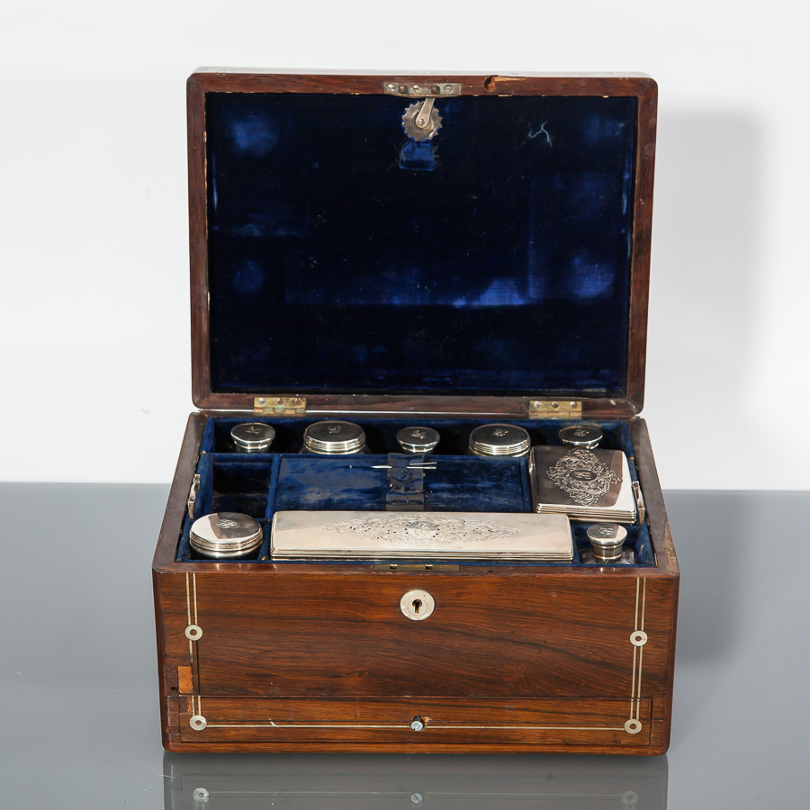 EARLY VICTORIAN ROSEWOOD LADY'S TRAVELLING VANITY CASE
top inlaid with scrolling mother of pearl