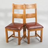 OAK KITCHEN TABLE AND SIX CHAIRS
in country house style, chairs with red leather seat pads,