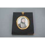19TH CENTURY OVAL MINIATURE PORTRAIT
depicting a young moustacheod officer, 7.5cm x 6.