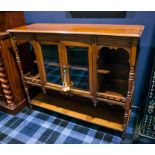 EDWARDIAN CARVED LIGHT MAHOGANY SIDEBOARD
with double rectangular glazed doors flanked by open