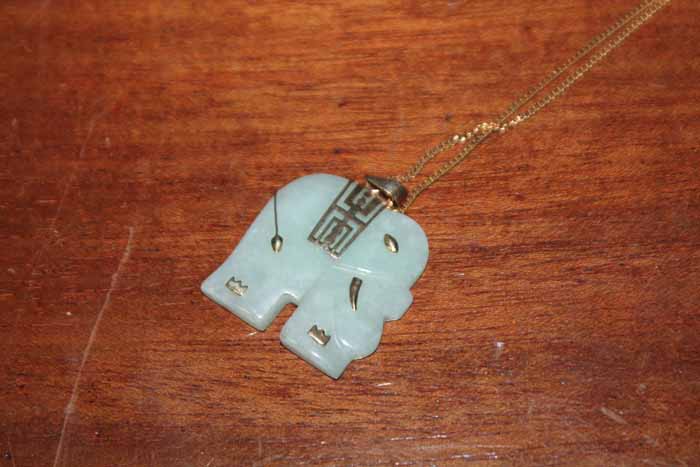 GOLD MOUNTED JADITE CHINESE ELEPHANT PENDANT
with gold chain
