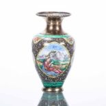 PERSIAN WHITE METAL AND ENAMEL VASE
with figural and animal decoration, 13.