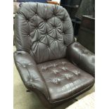 SCANDINAVIAN MODERNIST STYLE BROWN LEATHER STUDDED SWIVEL ARMCHAIR
with studded back and seat,
