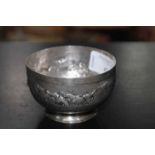 INDIAN WHITE METAL SUGAR BOWL
embossed with a hunting scene of dogs chasing deer and a herd of