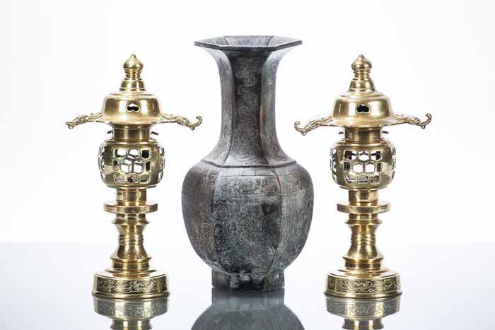 CHINESE BRONZE VASE AND TWO BRASS BURNERS
the vase of archaic design, 21.