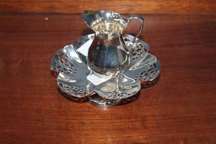 EDWARDIAN SILVER CREAM JUG
maker 'BB', Birmingham 1903; together with a silver bon bon dish,