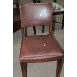 SET OF FIVE OAK AND STUDDED LEATHER DINING CHAIRS
back and seat studded with brown leather;