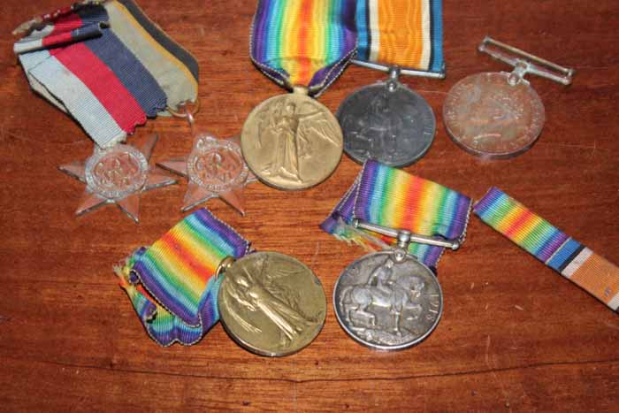 TWO PAIRS OF WWI MEDALS AND THREE WWII MEDALS
including a WWI pair awarded to '250224 DVR. J.