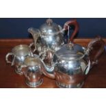 EARLY 20TH CENTURY SILVER PLATED FOUR PIECE TEA SERVICE
with Celtic inspired borders,