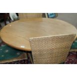 MODERN CIRCULAR DINING TABLE AND FOUR CANE BACK CHAIRS