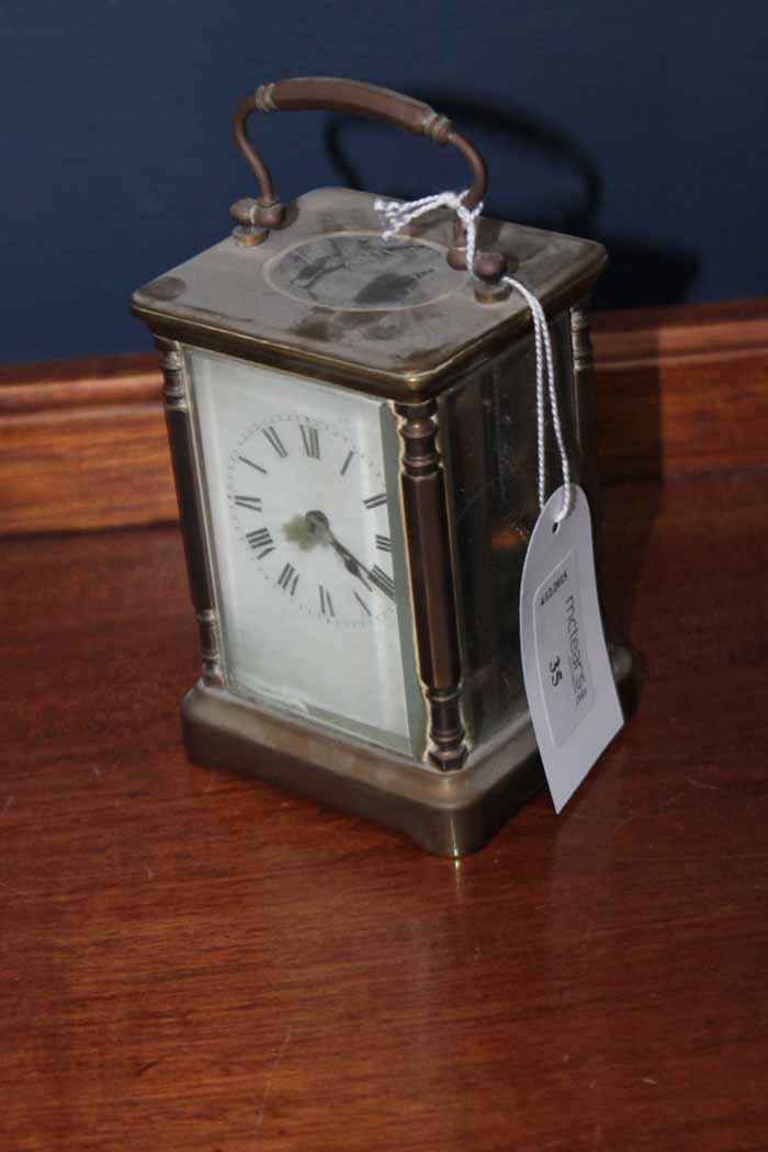 TWENTIETH CENTURY FRENCH BRASS CARRIAGE CLOCK unsigned two train movement striking on a gong,