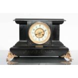 VICTORIAN EBONISED WATERBURY MANTEL CLOCK
signed two train movement striking on a coiled gong,