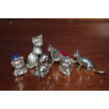 SIX SILVER MINIATURE FIGURES
including a cat pin cushion,