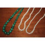 TWO STRANDS OF PEARLS AND A MALACHITE BEAD NECKALCE