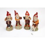 A SET OF FOUR MODERN CERAMIC FIGURES,