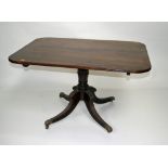 A good mahogany flip-top breakfast table