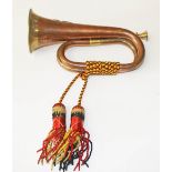A BRASS MOUNTED COPPER MILITARY HORN,