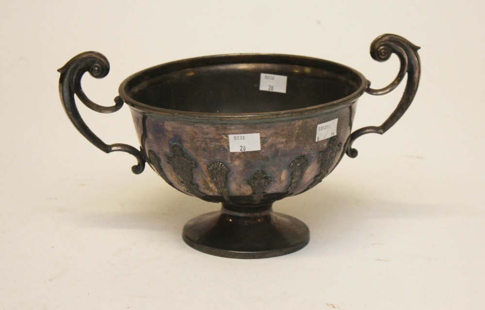 A HEAVY SILVER PLATED TWO HANDLED TROPHY
