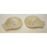 A PAIR OF BELLEEK SCALLOP SHELL BUTTER D