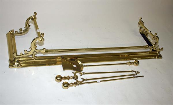 A MODERN BRASS FENDER,