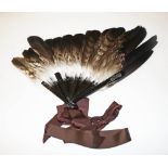 A LARGE EAGLE WING FAN,