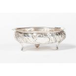 A VICTORIAN CHASED SILVER BOWL,