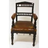 AN EDWARDIAN OAK DINING ROOM ARMCHAIR,