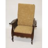 AN OAK RECLINING ARMCHAIR,   early 20th