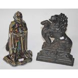 A HEAVY CAST IRON DOOR STOP,