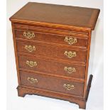 A BIRDS-EYE WALNUT FEATHER BANDED CHEST,