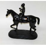 A HEAVY BRONZE EQUESTRIAN GROUP, O.R.M., modelled with racehorse with jockey up, on an oval