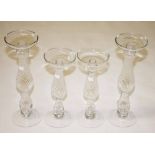 TWO PAIRS OF BALUSTER SHAPED GLASS CANDL