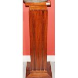 AN ART DECO STYLE ROSEWOOD PLINTH,   wit