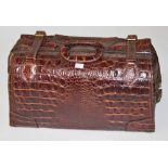 A MCBRINE CROCODILE SKIN WEEKEND CASE.