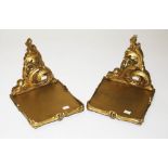 A PAIR OF ROCOCO STYLE GILT WALL BRACKETS, each with square shelf on a leaf scroll bracket, 9.5in (