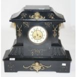 A BRASS MOUNTED ARCHITECTURAL STYLE POLISHED SLATE AND METAL MANTEL CLOCK, c.1900, with brass